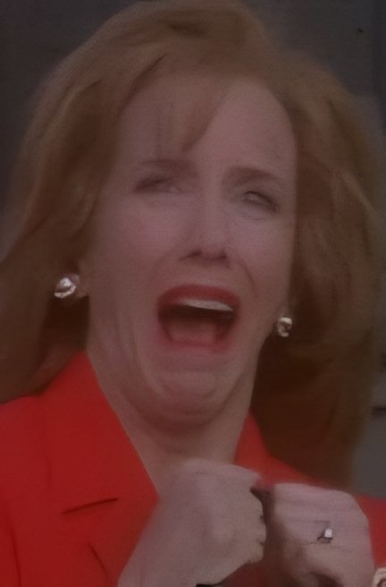 This is Laraine Newman in a brief cameo in Jingle All the Way.  I was about to bet my house it was Kristen Wiig.