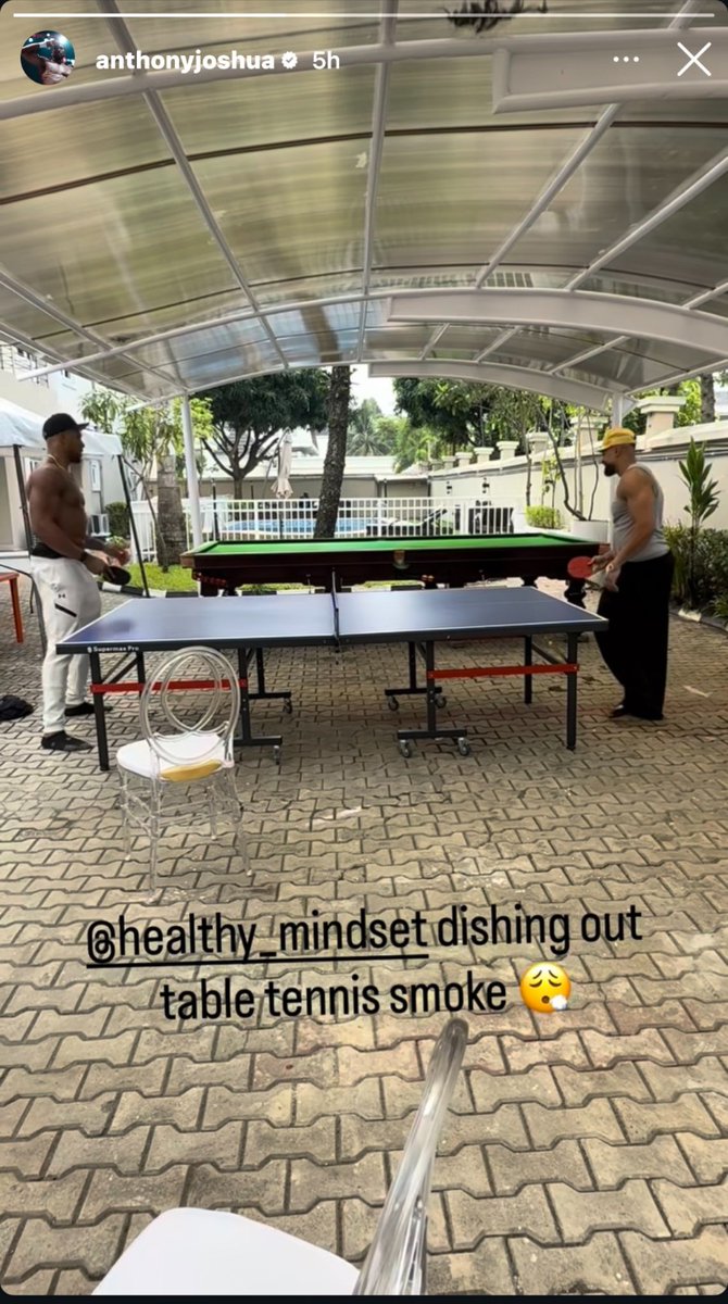 YomitheBA's tweet image. Anthony Joshua playing table tennis some hours ago in Nigeria.
The other guy wearing the armless top is reportedly dead. He died in the ill fated fatal road accident that Anthony Joshua luckily survived.