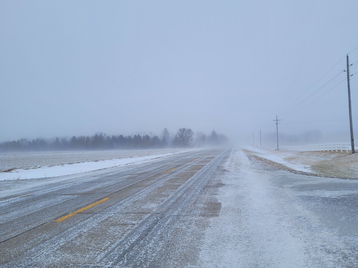 The roads are still covered in ice and very windy out. Take your time this morning.