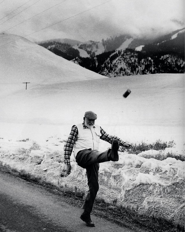 eyeonaxis's tweet image. Ernest Hemingway plays football with a beer, 1959