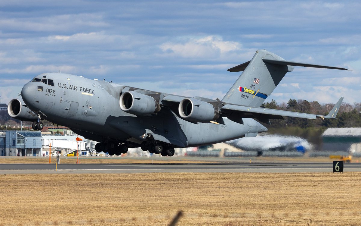 The Moose in its natural habitat 🫎. A NC ANG C-17 climbing out of runway 33 at BGR.