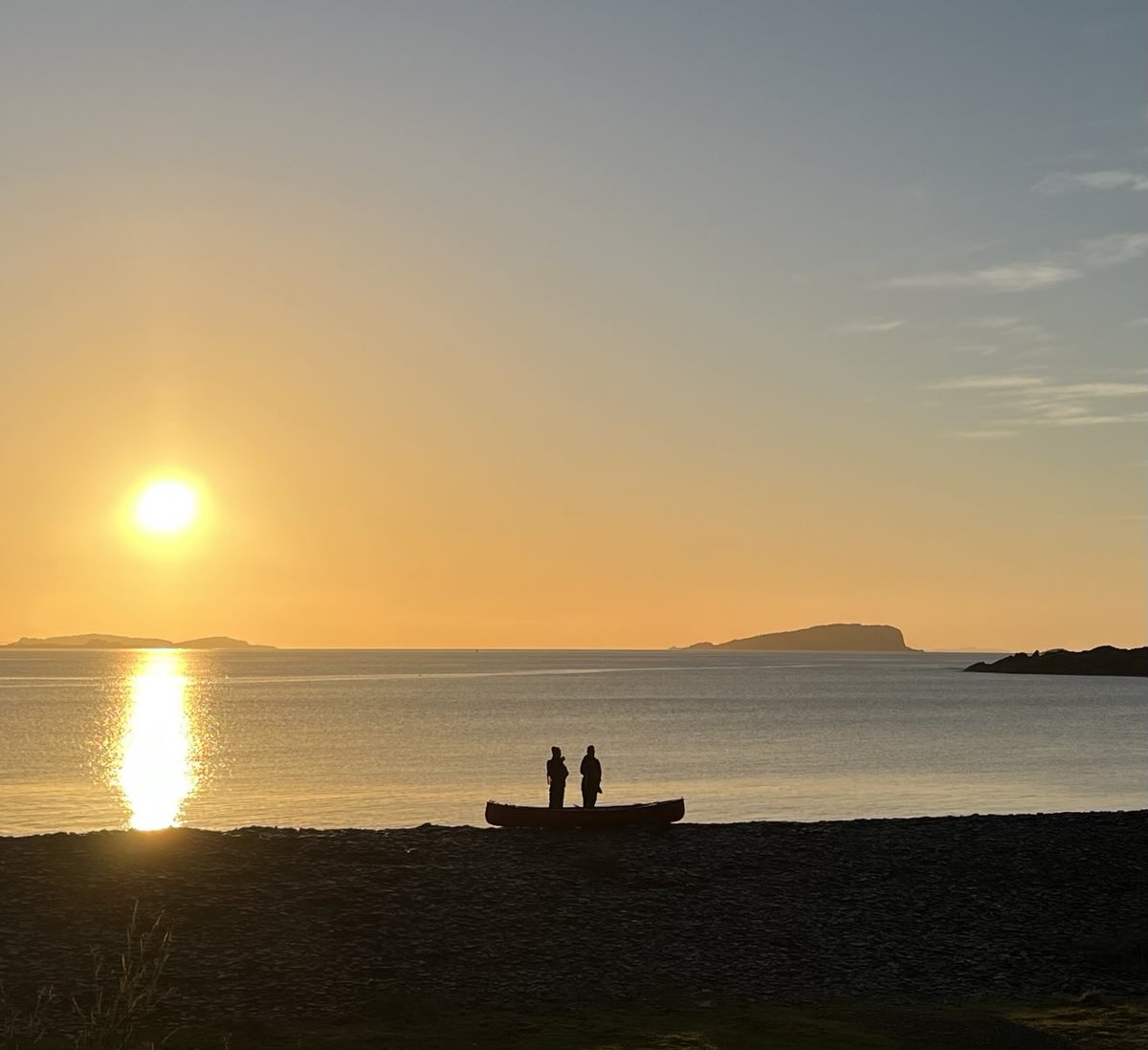 SarahTryon25's tweet photo. Two folk, having a cuppa, in a canoe, on the sea shore, not watching the sunset, #Ellenabeich https://t.co/Pg2NmhdQne