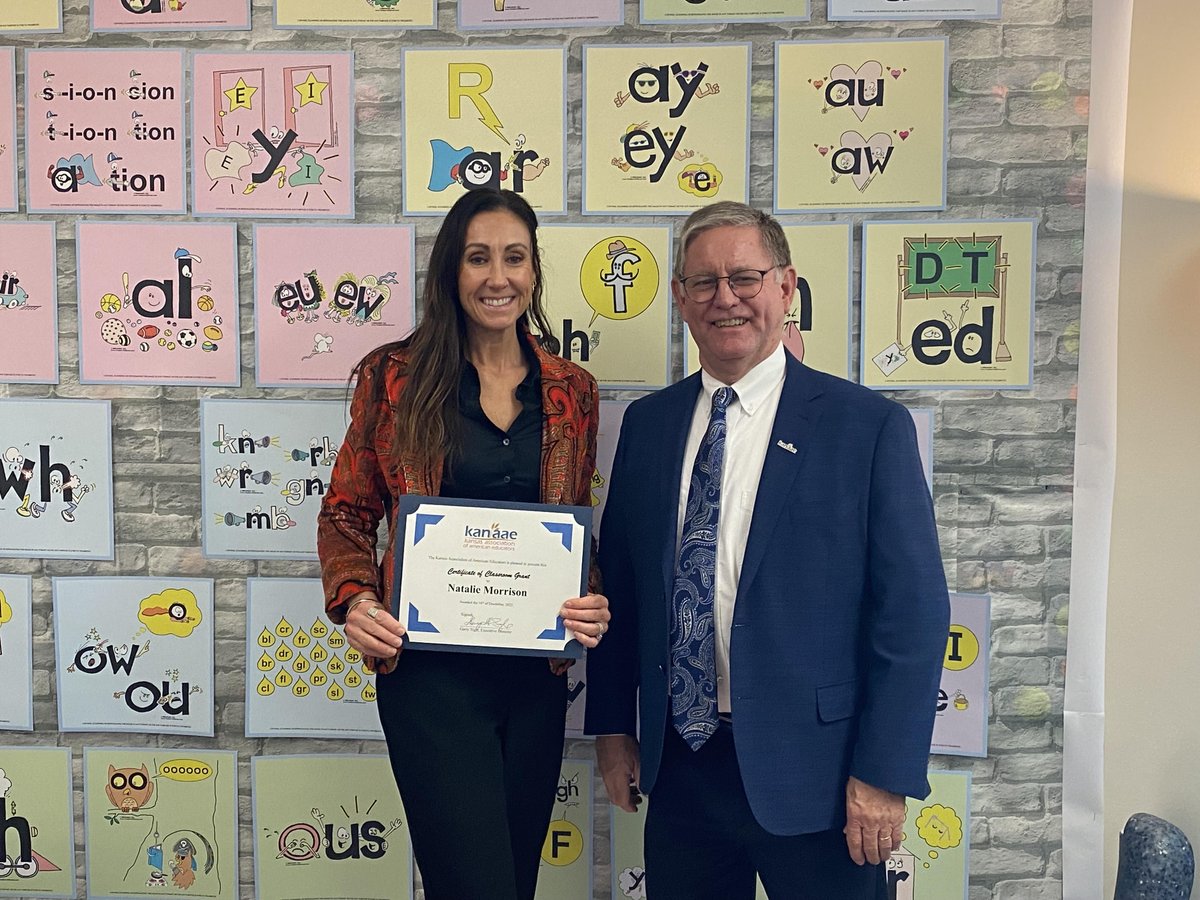 Natalie Morrison, K to 4th interventions teacher at Edgerton ES, <a href="/GardnerEdgerton/">Gardner Edgerton USD 231</a>, was recently honored as a <a href="/kanaaeorg/">Kansas Teachers</a> $500 Classroom Grant winner. She will be using the funds to purchase reading resources for her students, some which are pictured behind her. Congrats Natalie!