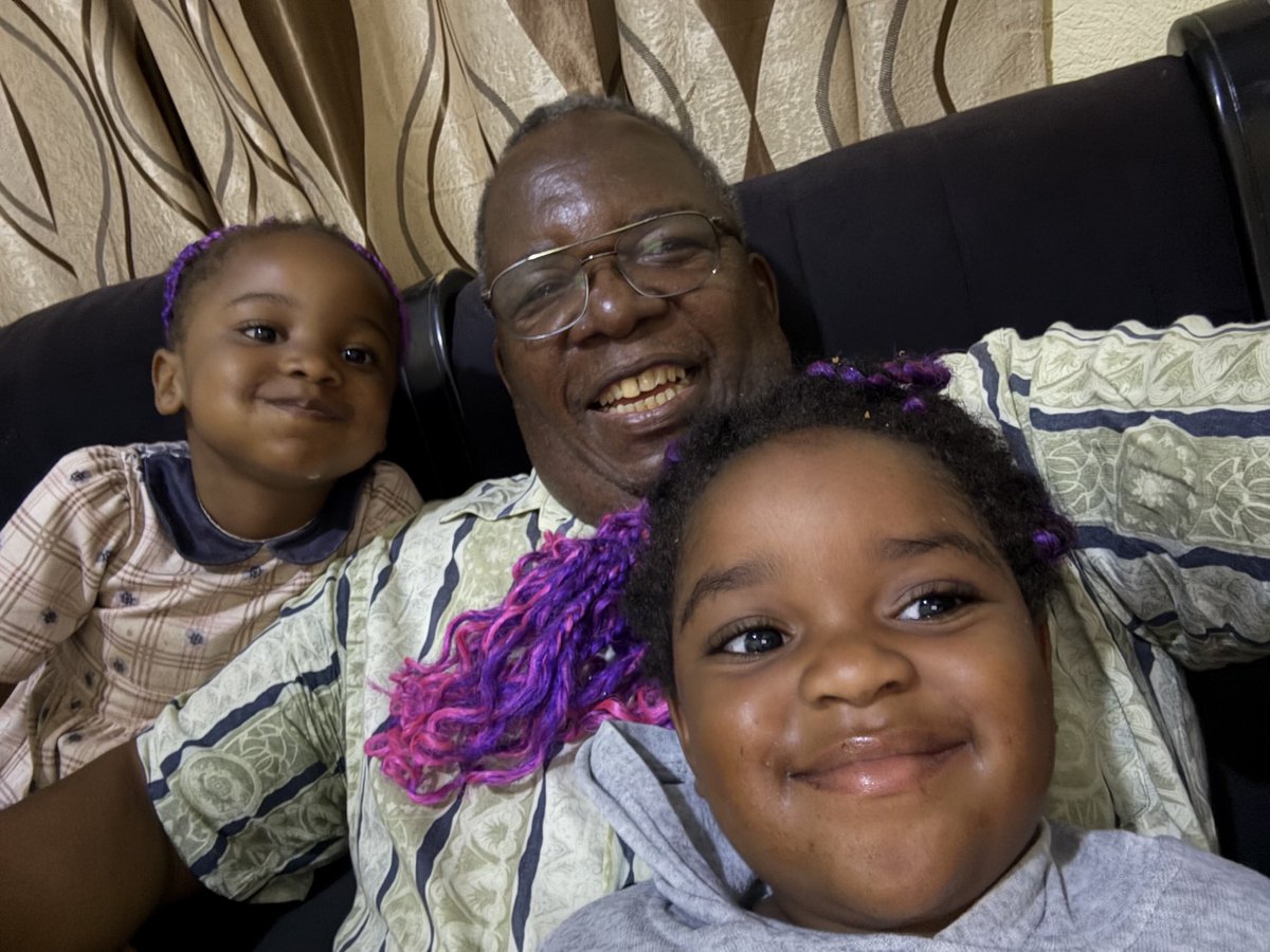Relaxing with my grandchildren at our Gutu rural home during Xmas 2025 holiday.