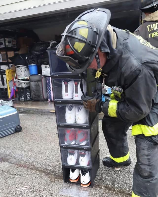 HardestFitPics's tweet image. Chicago fire department rescuing a civilian's sneaker collection during a building fire.