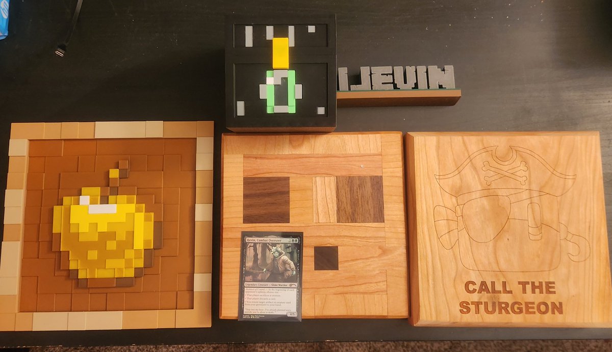 iJevin's tweet image. Best birthday ever! Some of the gifts people sent. Custom cutting boards, 3d printed items and a custom magic card! So awesome.

Cutting boards by: Calla.username