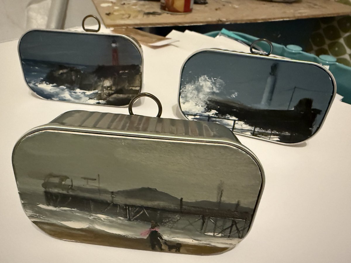 Little paintings in sardine tins
