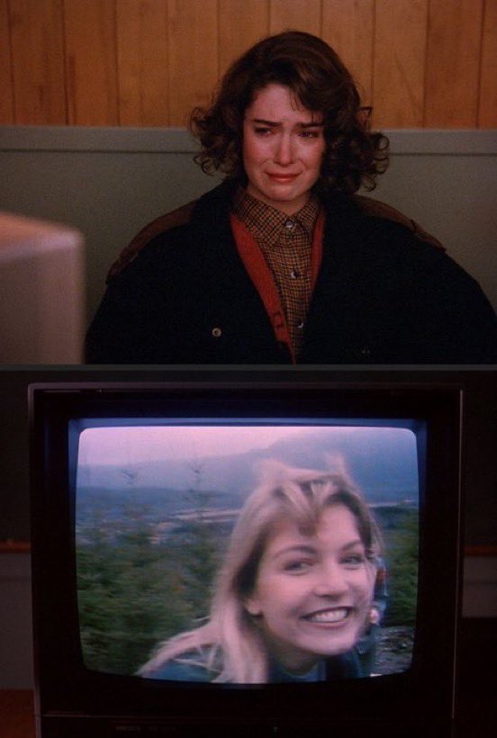 devvtang's tweet image. Both looking at a framed version of the other