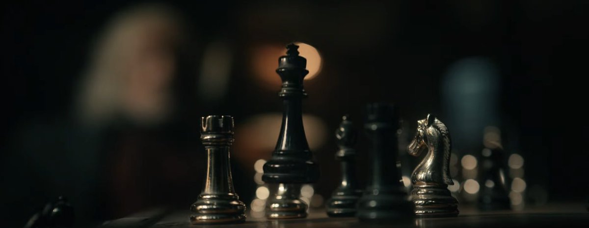 Charles and Erik playing chess over the years