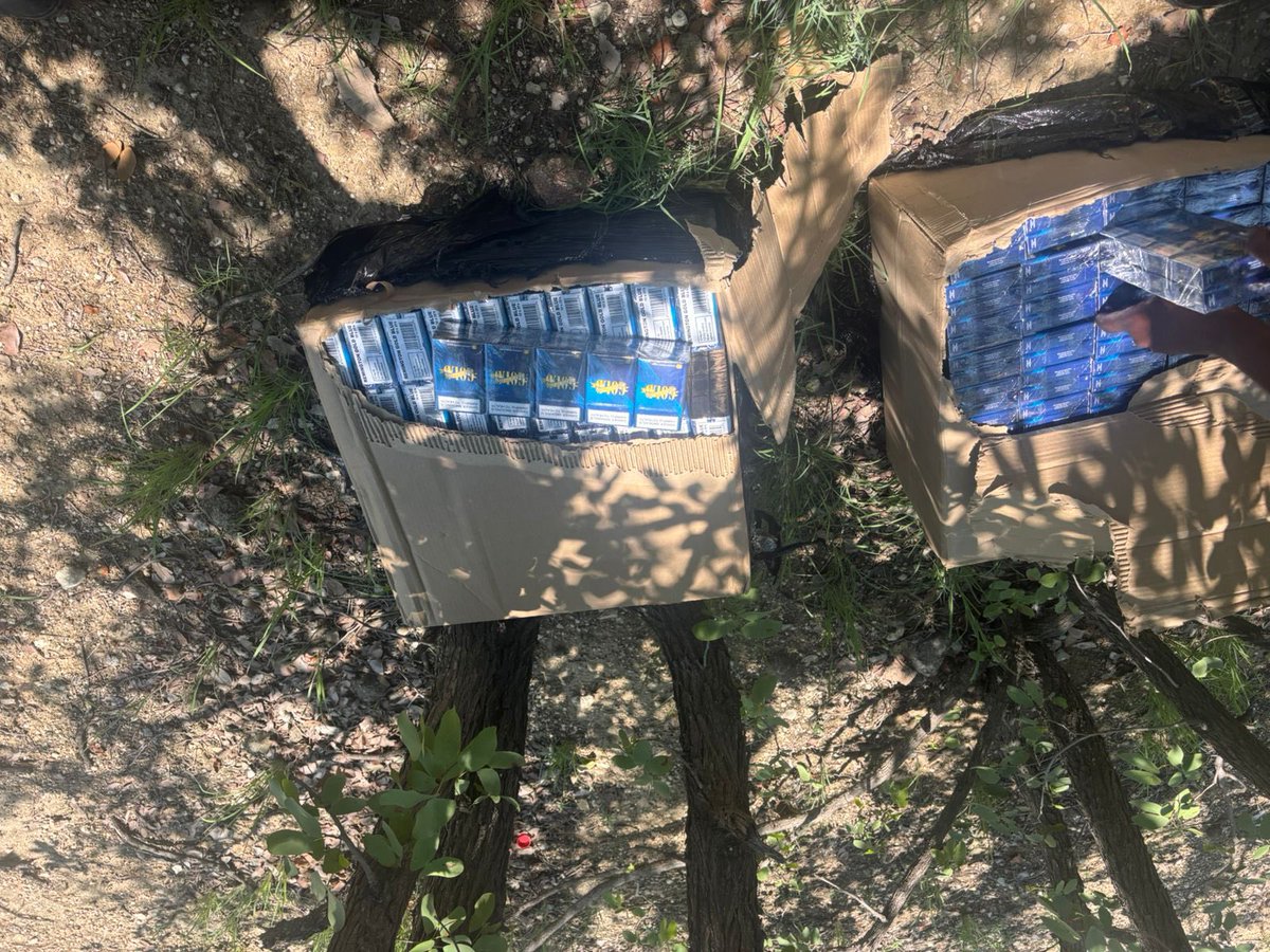 Abramjee's tweet photo. BMA INTERCEPTS CIGARETTE SMUGGLING ATTEMPT USING DRONE TECHNOLOGY AT BEITBRIDGE:

@TheBMA_SA 

The Commissioner of the  Border Management Authority (BMA), Dr Michael Masiapato  has commended the successful interception of a cigarette smuggling operation today at the Beitbridge Port of Entry through the use of advanced drone surveillance technology.

As part of the BMA’s intensified law enforcement operations under the 2025/2026 Festive Season Security Plan, the aerial drone detected suspicious movement within the border law enforcement area near the Beitbridge Port of entry . 

Real-time drone footage enabled BMA officers to swiftly track and intercept suspects attempting to smuggle illicit cigarettes to the value of  R42 797.00  into the Republic of South Africa.

The interception confirms the growing effectiveness of technology-driven border management interventions, particularly at high-risk and vulnerable areas along the borderline. 

The seized cigarettes have been secured, and the suspects were handed over to the South African Police Services for further processing in line with the criminal legislation.

Commissioner Dr Masiapato, commended the operational teams for their vigilance, noting that the deployment of drone technology has significantly enhanced the Authority’s ability to detect and disrupt organised smuggling networks.

“This interception demonstrates that the BMA is adapting to increasingly sophisticated criminal methods by leveraging modern surveillance technologies. Despite limited resources, our officers remain resolute and proactive in protecting the country’s borders,” said the Commissioner.

Members of the public are encouraged to report any suspicious cross-border activities through Operation Hi-Tivise on 0801 229 019 or via https://t.co/YtOWvKqdxm
