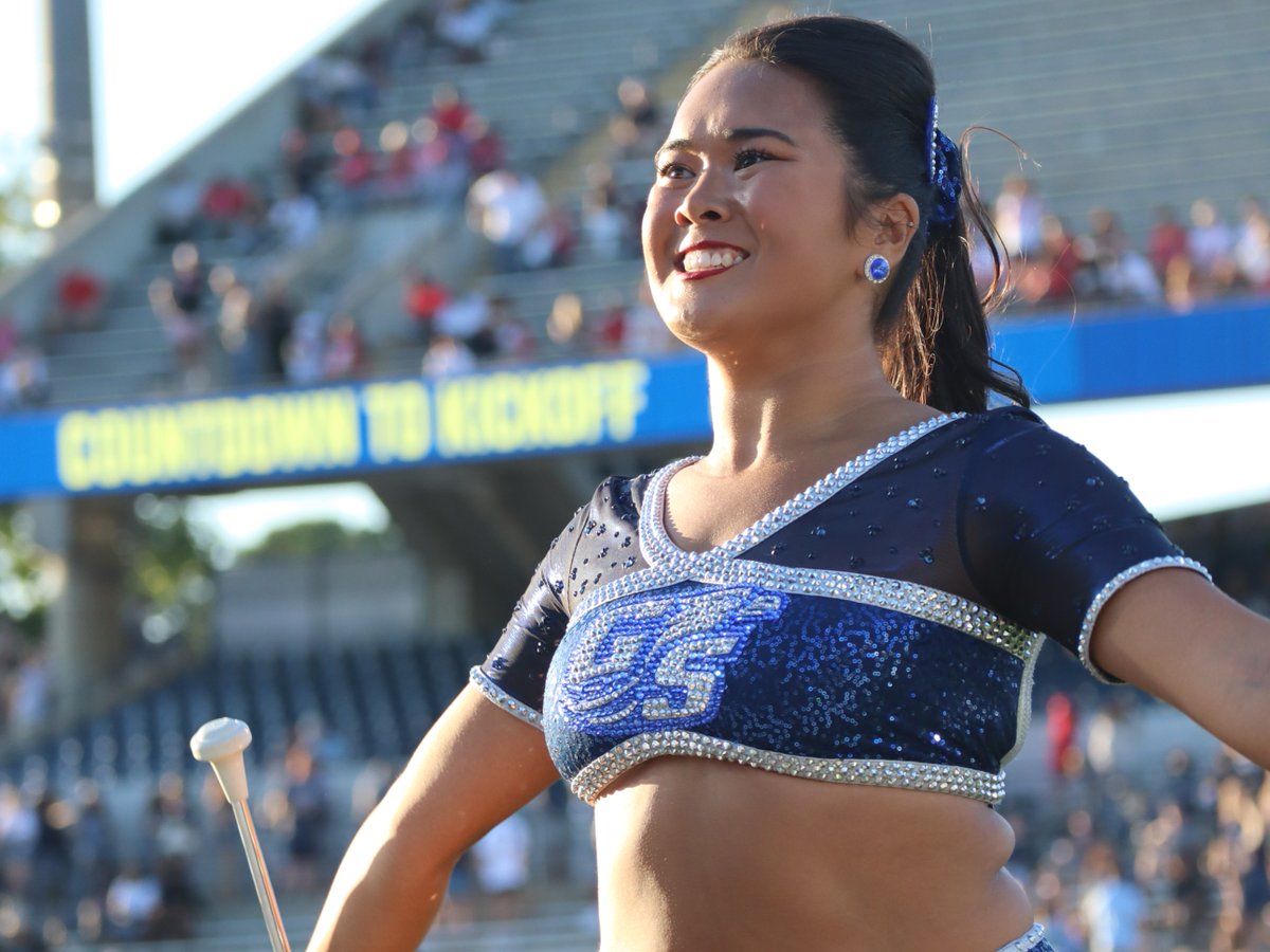 GeorgiaSouthern's tweet photo. Meet Gracie Allen: the feature twirler for Southern Pride Marching Band, Miss Georgia Southern and future pediatric oncologist whose story is inspiring Eagle Nation.

Her story 🔗 https://t.co/gDQxWpbhmH

#GSGrad25 🎓 https://t.co/BP2CDSVEAY