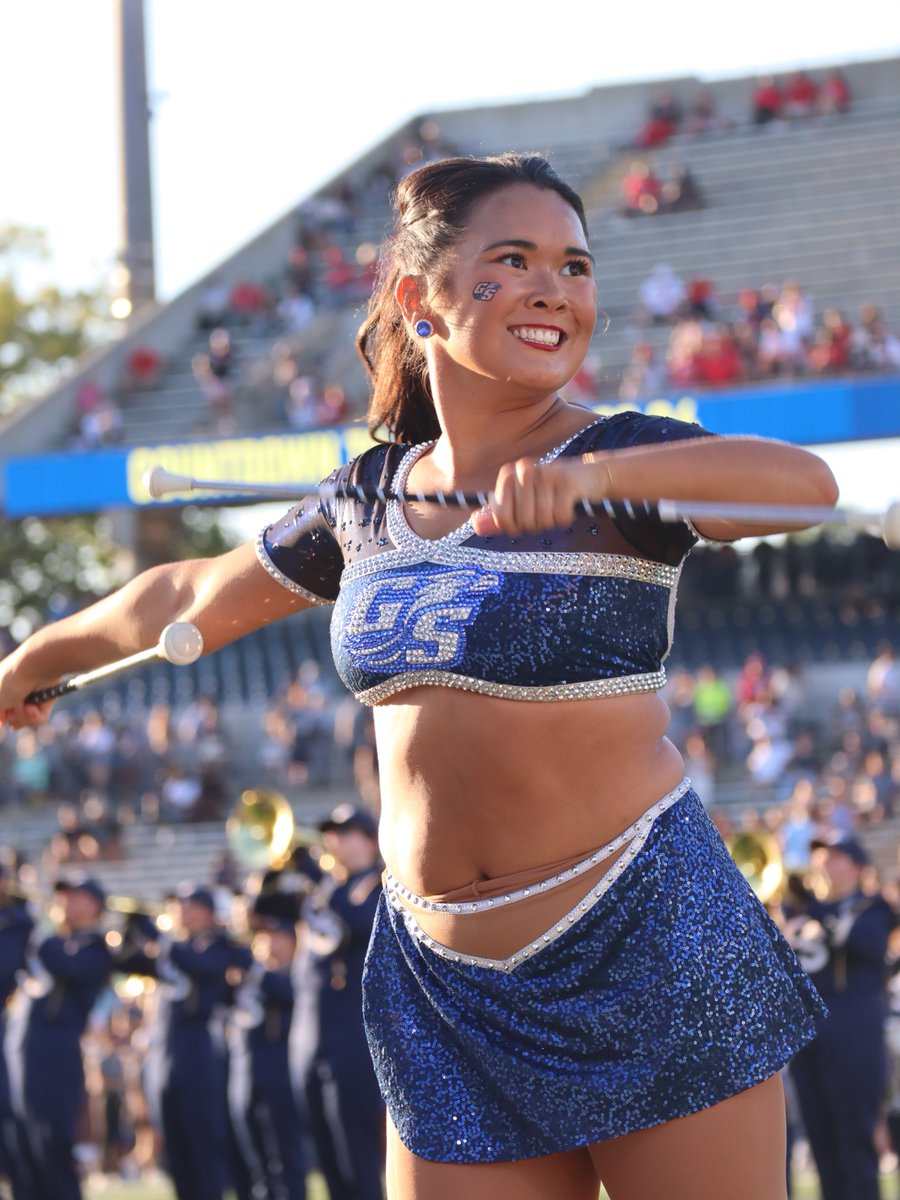 GeorgiaSouthern's tweet photo. Meet Gracie Allen: the feature twirler for Southern Pride Marching Band, Miss Georgia Southern and future pediatric oncologist whose story is inspiring Eagle Nation.

Her story 🔗 https://t.co/gDQxWpbhmH

#GSGrad25 🎓 https://t.co/BP2CDSVEAY