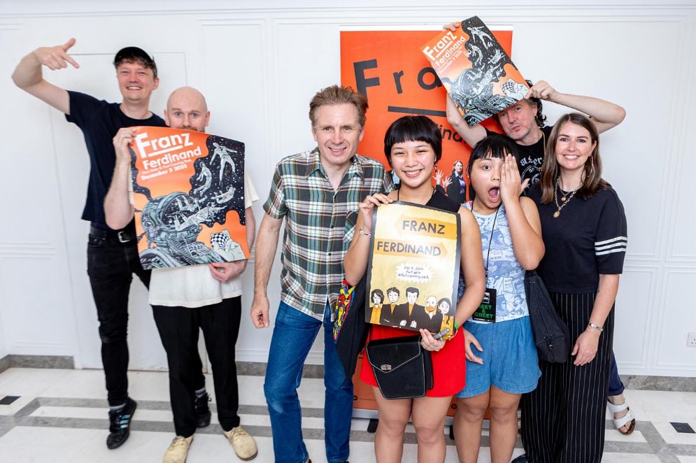 Sashicsn's tweet photo. My dad won a Franz Ferdinand poster contest we joined for fun—by God’s grace!
He won free tix + meet &amp; greet. But it clashed with his Tokyo Comic Con trip, so my sister  and I went instead. What a blessing! Even my poster got to be signed! 🧡 https://t.co/ftwmCaAges
