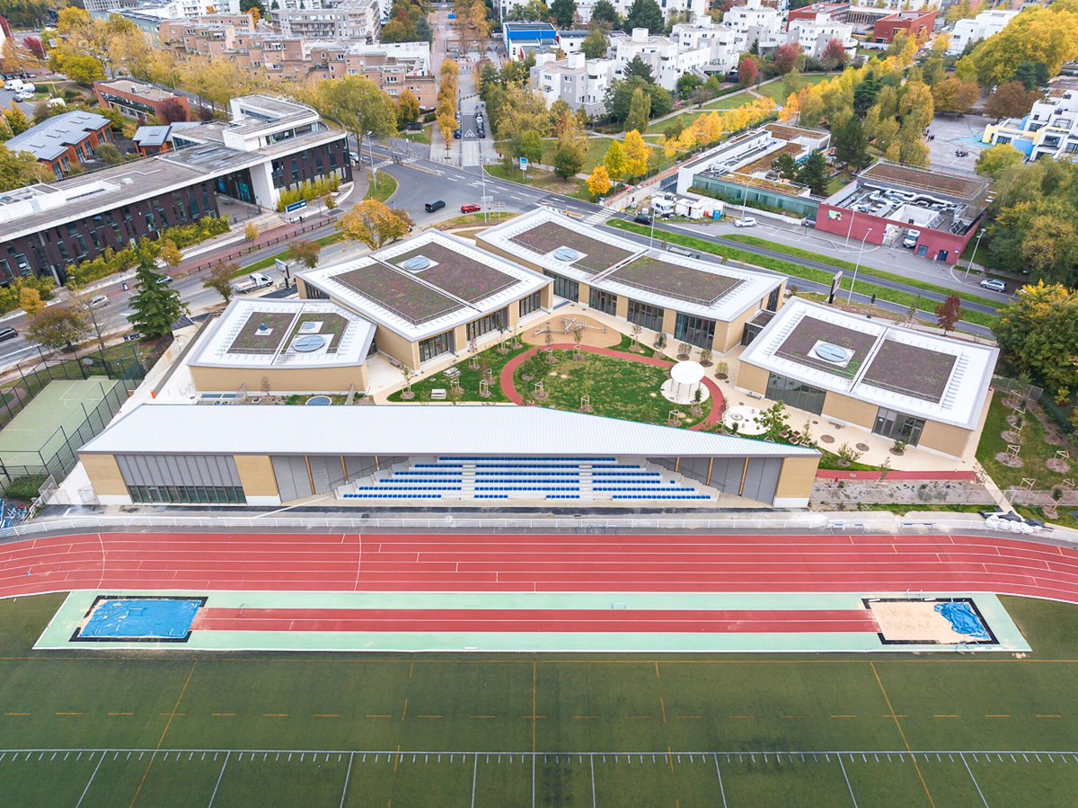 Archello's tweet image. Designed by HEMAA Architectes, the Parc des Loges Childhood and Sports Center is shaped by rammed earth and timber construction, embedding learning spaces directly into the landscape.
archello.com/project/parc-d… 

#RammedEarth #TimberArchitecture #LowCarbonDesign
