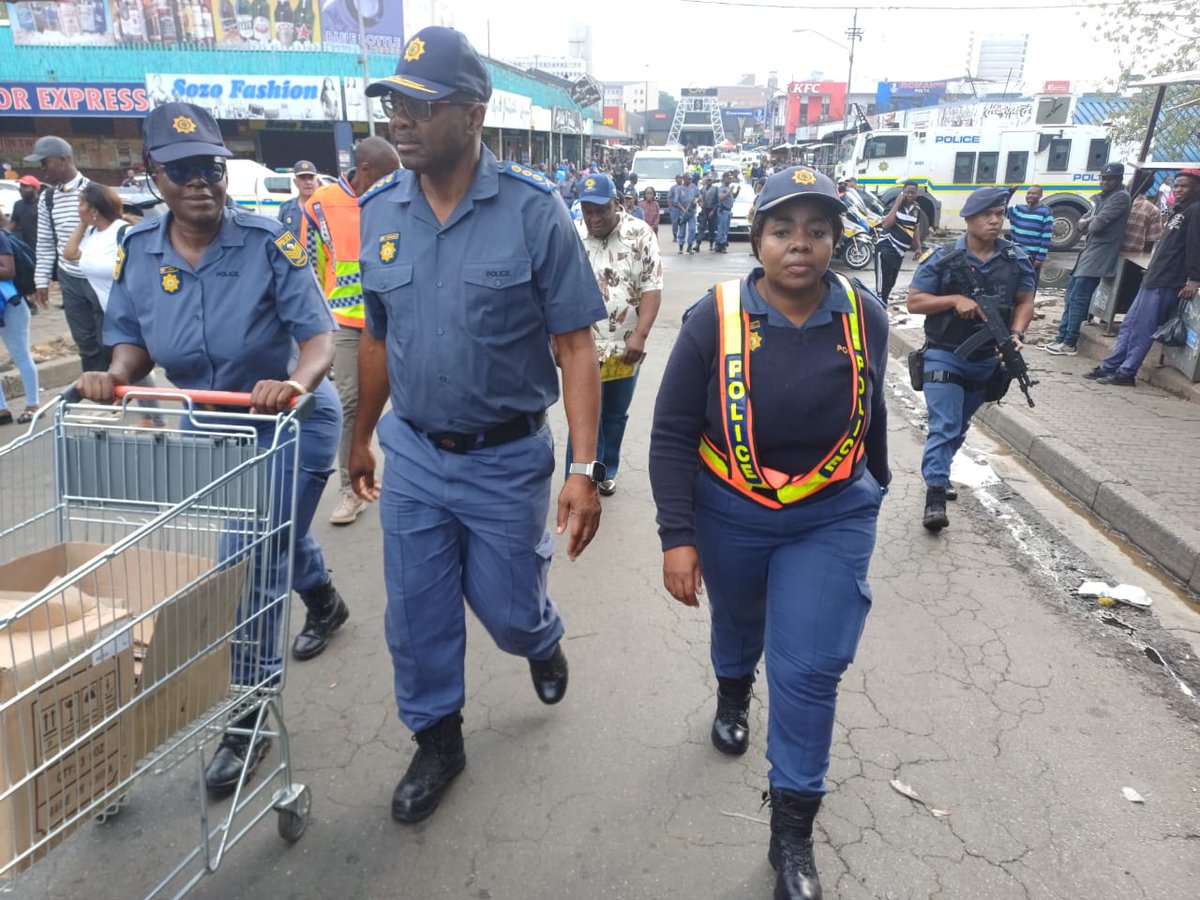 SAPoliceService's tweet photo. GP: SAFER FESTIVE SEASON OPEARTIONS IN EKURHULENI

As part of the ongoing Safer Feative Season Operations, The Provincial Commissioner of the Police in Gauteng, Lieutenant General Tommy Mthombeni together with the Acting Executive Mayor for Ekurhuleni, Ald Jongizizwe Dlabathi, are conducting a walk about at Golden Walk Mall and Germiston Taxi Rank. 

The Provincial Commissioner is joined by Deputy Provincial Commissioner for Policing, Major General Fred Kekana, Deputy Provincial Commissioner for Crime Detection, Major General Mbuso Khumalo, the District Commissioner for Ekurhuleni, Major General Anna Sithole, senior officials from Ekurhuleni Metro Police, Gauteng Traffic, Department of Home Affairs as they engage shoppers and commuters to share crime prevention hints for festive season. In the process,  compliance inspections are also conducted and the law is being enforced.

Furthermore, The Provincial Visible Policing together with various stakeholders including the Community Police Forum are conducting exhibitions at the mall and also engaging with shoppers through Coffee with Cop initiative and giving out safety tips pamphlets. NP