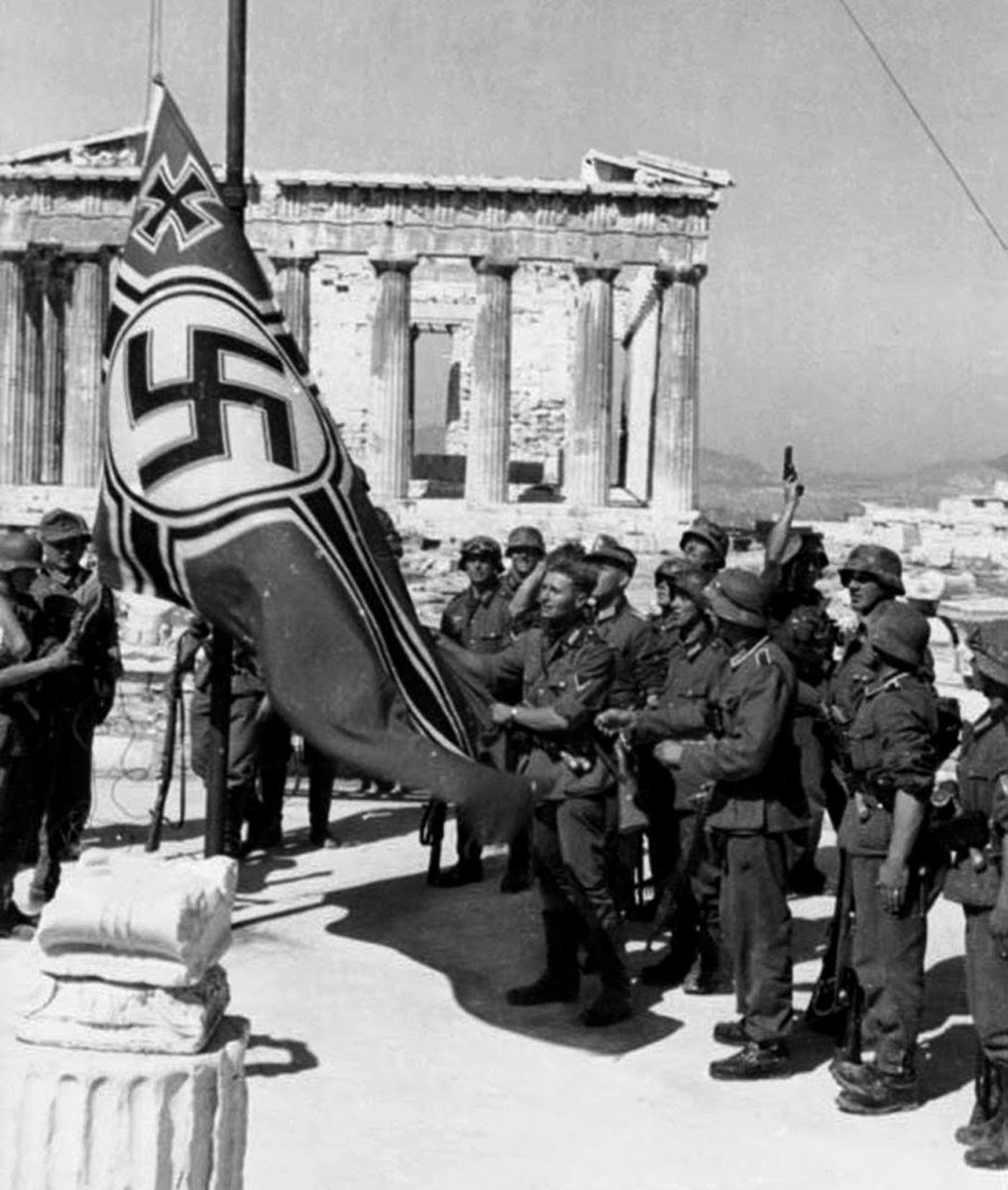 unconquered_sol's tweet image. Victorious German soldiers of the 2nd Panzer Division raising the Reichskriegsflagge over the Acropolis of Athens, April 27th, 1941