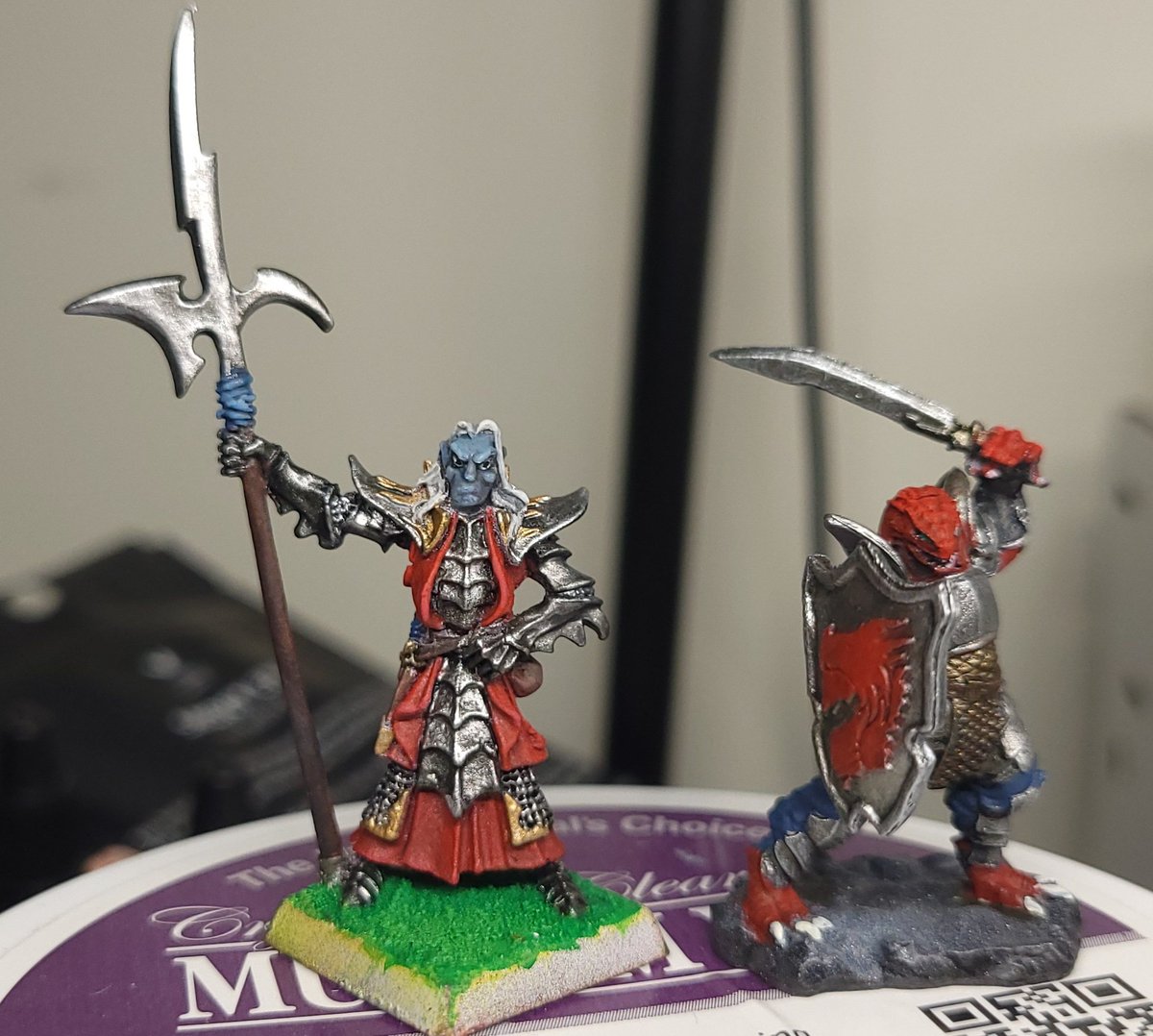 Even though I'm a novice I taught my brother how to paint minis when he visited. Mine on the left his on the right