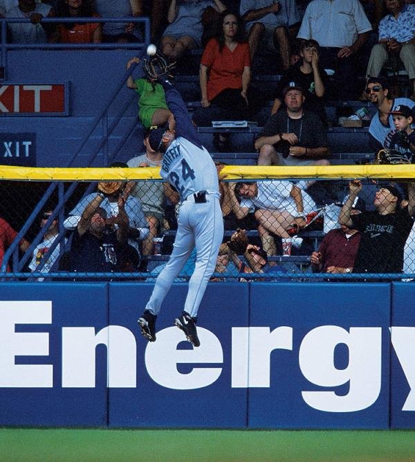 Ken Griffey Jr. scales the wall and makes an amazing catch at Tiger Stadium.