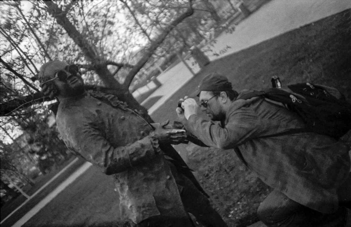 ABBSound's tweet photo. Spring Cult of Shades, or Film vs. Statues
(LOMO LC-A + Svema A‑2Sh film)
Glass becomes the film.
You’re inside, but not quite whole.
Profile waits to speak.
#filmphotography #lomolca #svemaa2sh #svema #expiredfilm #bnw #35mm #streetportrait #believeinfilm #blackandwhite #bw https://t.co/KEgQLHEBJ9