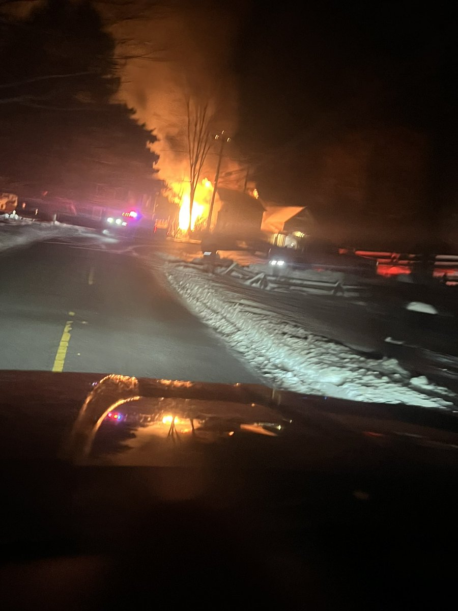NewtownCTFire's tweet photo. First officer on scene was the captain from Hook &amp; Ladder confirming a working fire. Low temperatures, live power lines coming down, ice and a mechanical failure with a supply engine all made for a challenge. All residents were unharmed. No firefighters were injured https://t.co/7opGGh4gOa