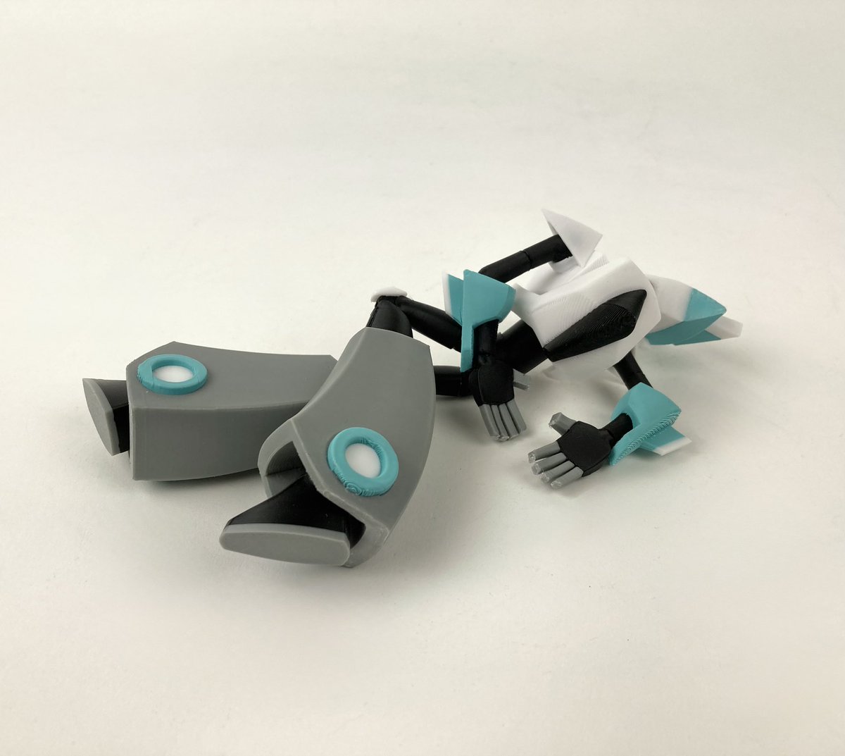 Still could use some work (eyes) but here’s how my bjd of Flipper came out! +alt mode and dolphin friend :) #tfa #transformers