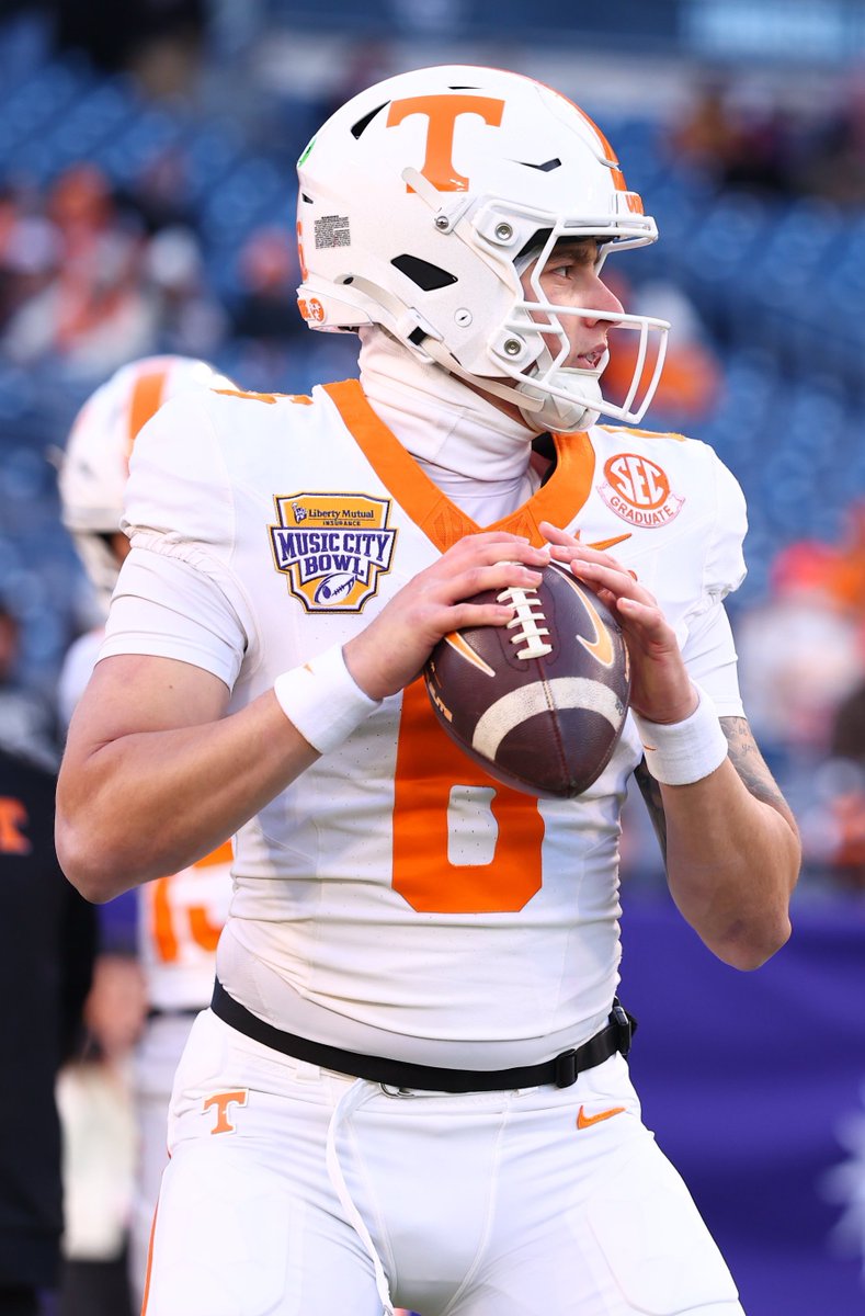 CfieldsVFL's tweet photo. The @Vol_Football Nike era began in the Music City, and ends in the Music City Bowl. 10 years of Nike football uniforms comes to a close today! From checkerboard stripes, to smoky mountain helmets, to dark mode. It’s been a wild ride. But the future is bright, and I can’t wait to see what’s next! #GBO