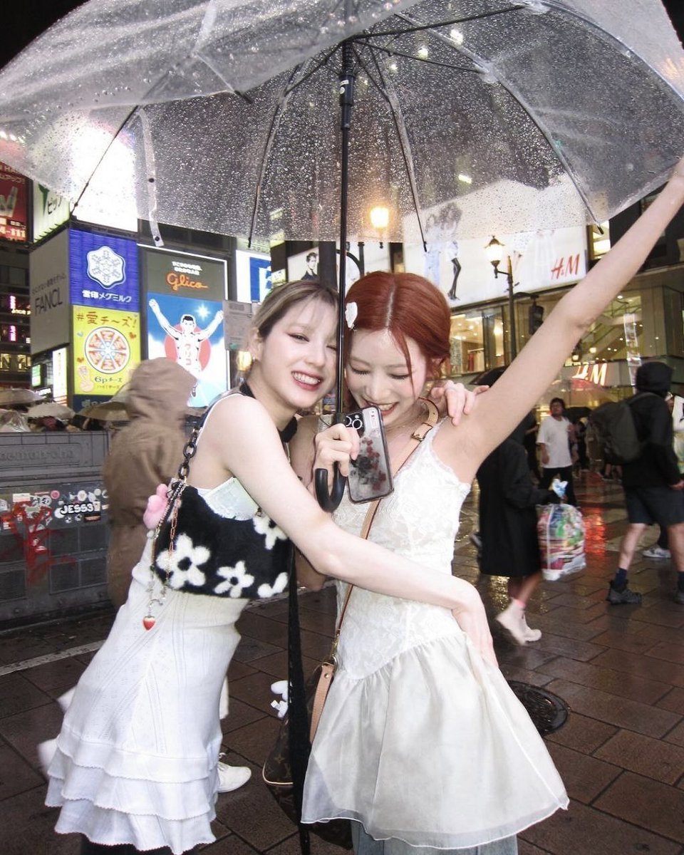 In  the  heart  of  Osaka,  we  stumbled  upon  a  charming  scene  that  invited  us  to  pause  and  cherish  the  present  moment.  Each  snapshot  revealed  a  glimpse  into  our  friendship,  filled  with  genuine  expressions  and  unfiltered  joy.