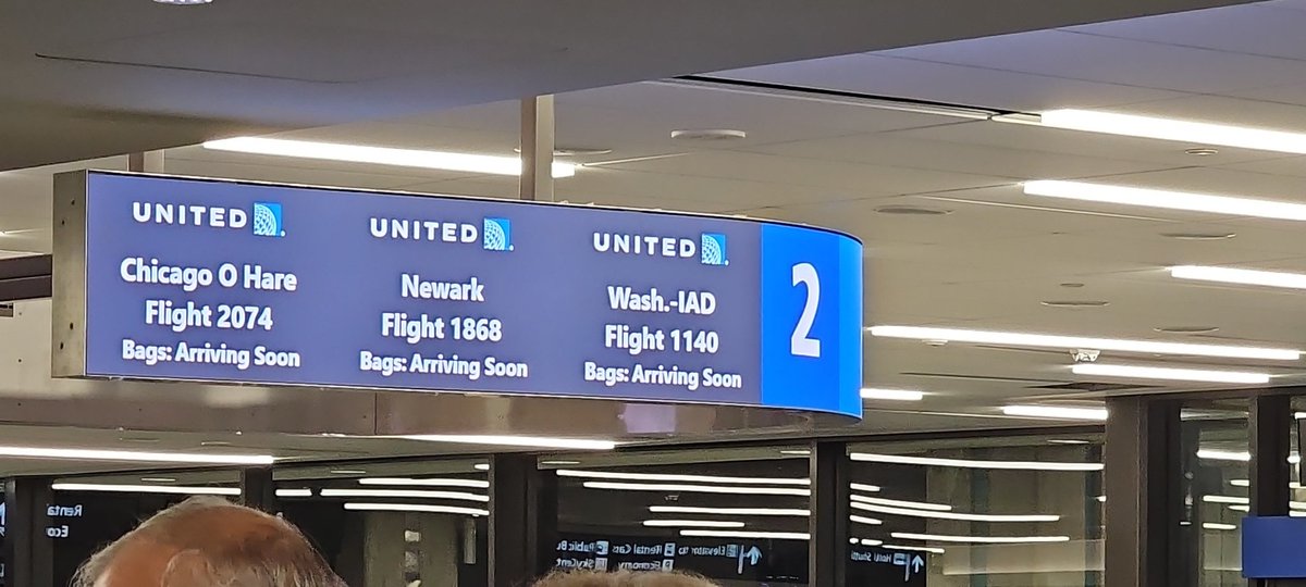 sharond1001's tweet photo. United Airlines TPA is becoming like EWR, we used to get bags in 10 minutes attending the worst 20. Almost 30 minutes now...no bags....do better! The same sign for 15 mins now...define Soon!!!! https://t.co/sdCfJuzuZK