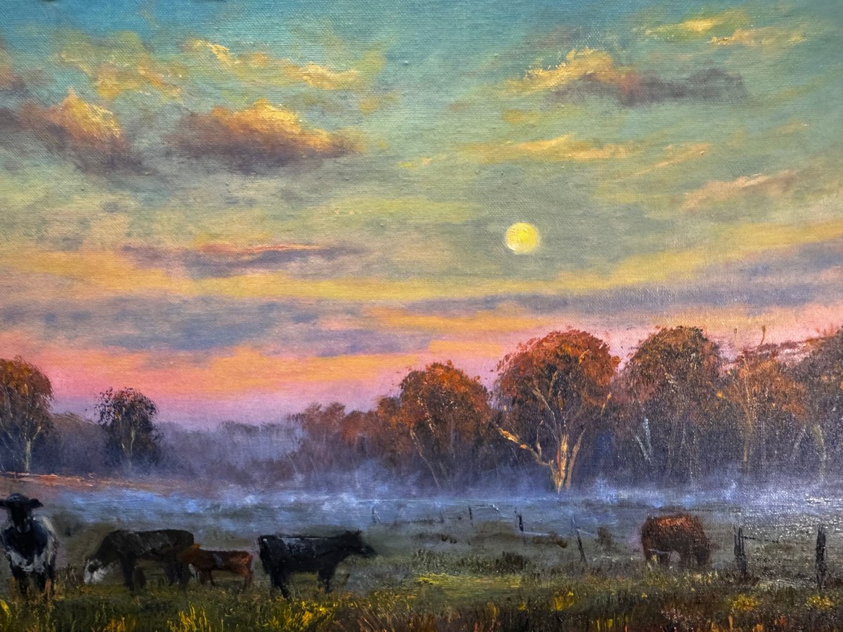 ArtistVidal's tweet photo. Morning light paints a serene portrait of a NSW cattle farm, capturing the harmonious blend of nature and agriculture. The golden hues of sunrise illuminate vast pastures, where cattle graze peacefully. This commissioned piece for 2025 encapsulates rural tranquillity. https://t.co/DMuKbg0ffT
