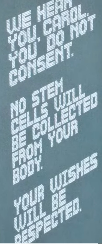 Wears a white jacket. 
Wants to cure her. 
Asks for her written consent. 
He is the last person she sees before she is alone for 40 days (medically induced coma)
He is her doctor