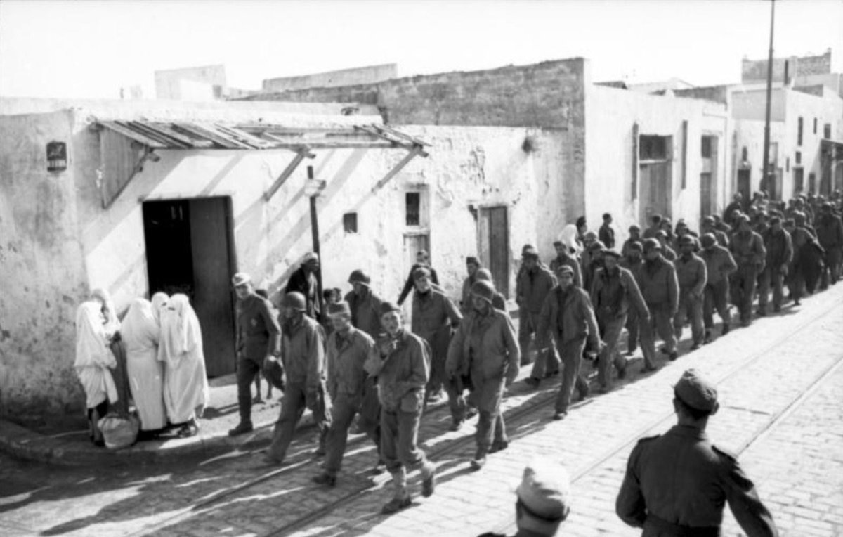 A photograph showing US prisoners-of-war after the Battle of Kasserine Pass in Tunisia, February 1943. The Allies lost this battle against Axis forces during the Tunisia Campaign (1942-3). (German Federal Archives)