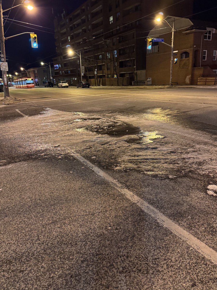 atmarais's tweet photo. @311Toronto  for quite a few weeks puddles have been forming in this area at the intersection of Lakeshore and Thirteenth. Worried that it is more than rain/snow as it never drys up and it’s getting larger. Thanks. https://t.co/gLBNqmljAX