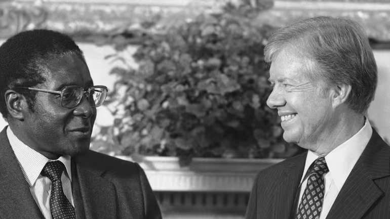 TAmTrib's tweet photo. Jimmy Carter is remembered mainly as a bumbling idiot, but in reality, he was the worst of the Third Worldist presidents we've had

He handed over southern Africa to the communists by ensuring Mugabe took over Rhodesia

He ensured America would be flooded with the refuse of the decolonized world with the Refugee Act

He unnecessarily gave up the Panama Canal

He refused to take harsh action against the Black Liberation Army, Black Panthers, Weather Underground, FALN, or other groups engaging in terroristic murder and mayhem on behalf of anti-American, pro-race communism agendas

Carter was awful. Far more abominable than he is remembered as being
