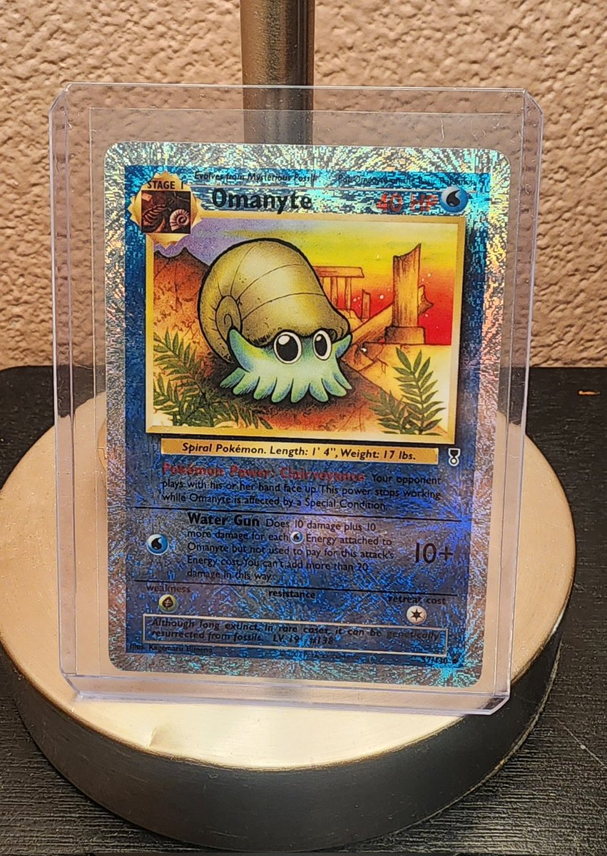 Download Omastar Versus Kabutops Desktop Wallpaper | Wallpapers.com, image size:851x1199