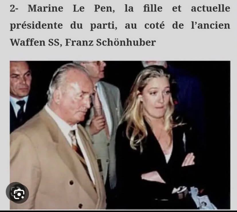 PDohen's tweet image. Il paraît que @MLP_officiel veut pas voir tourner cette photo où on la voit a côté d un waffen SS ... 
Ça rappelle les origines du @RNational_off