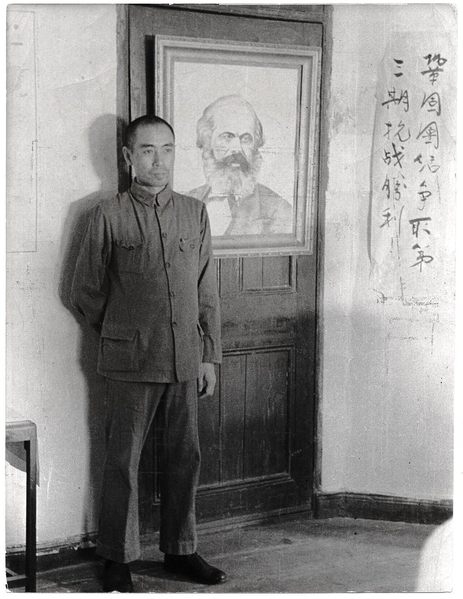 Rakeshhkumaar's tweet image. Zhou Enlai standing before a portrait of Karl Marx at the headquarters of the Hankou Central Committee of the Chinese Communist Party, China, 1937, symbolizing the ideological roots of the Chinese revolution.