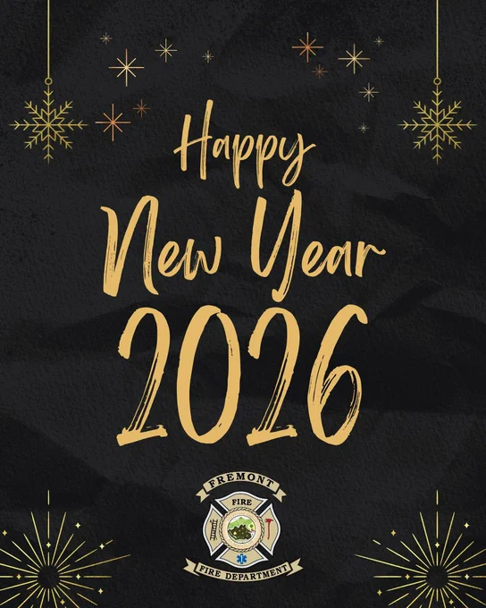 Elegant black background with gold text wishing Happy New Year 2026, decorated with snowflakes and stars, featuring Fremont Fire Department emblem.