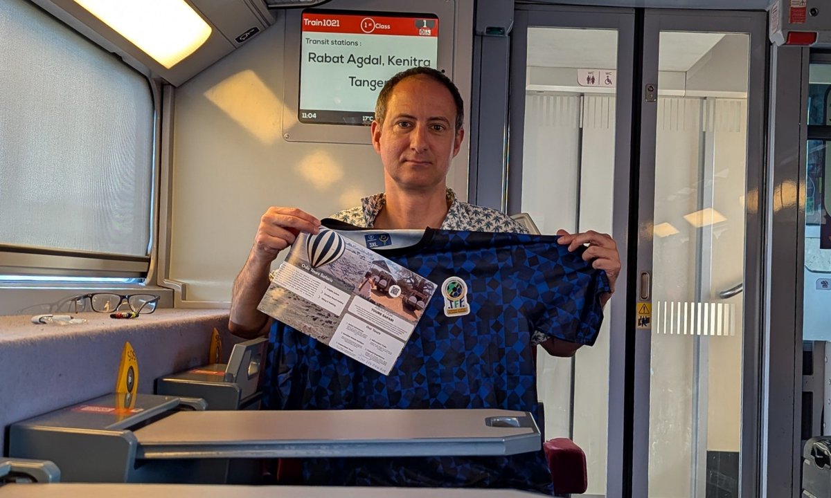 Classic AFCON moment. Met Tanzania 🇹🇿 fan on high speed Al Boraq train. He gifted me a shirt &amp; tried to sell me a safari 🦁🐘🐆 Asante!