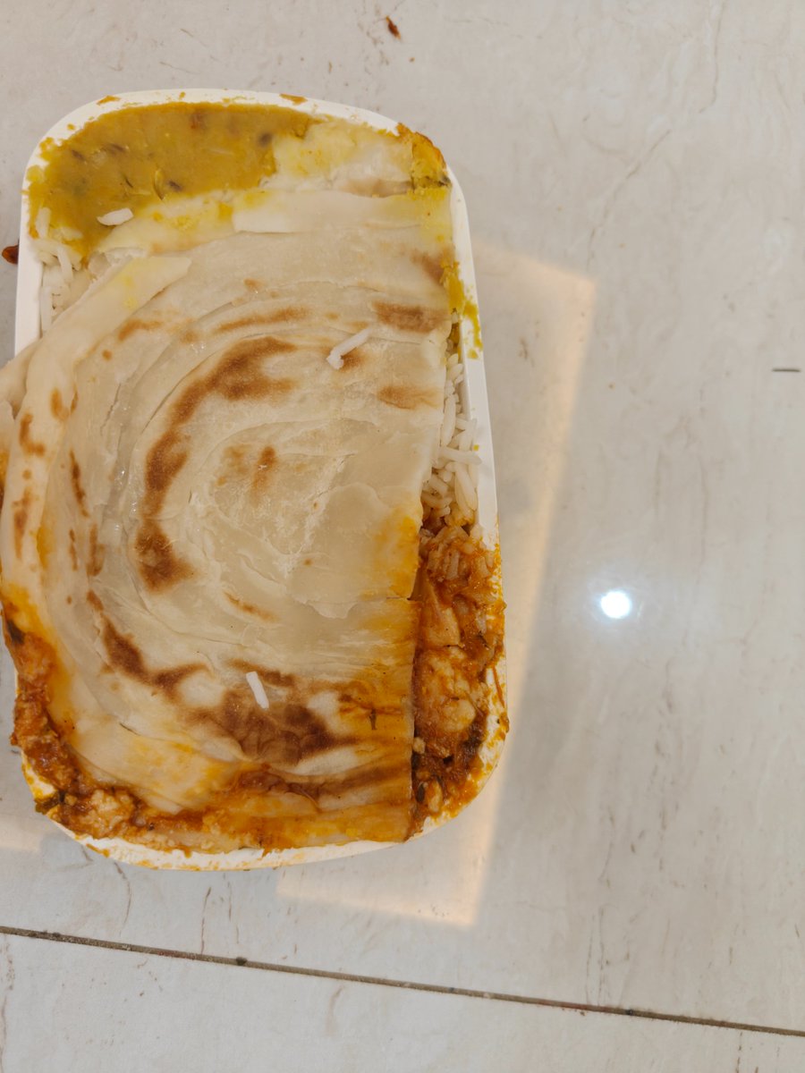 sufroze's tweet photo. @Saudi_Airlines extremely disappointed with the food served on our recent flight from jeddah to Bangalore. Four dishes stuffed in 1 container!! Roti, dal, paneer curry and rice.. how do u justify such an aberration?? https://t.co/x78czXiB3e