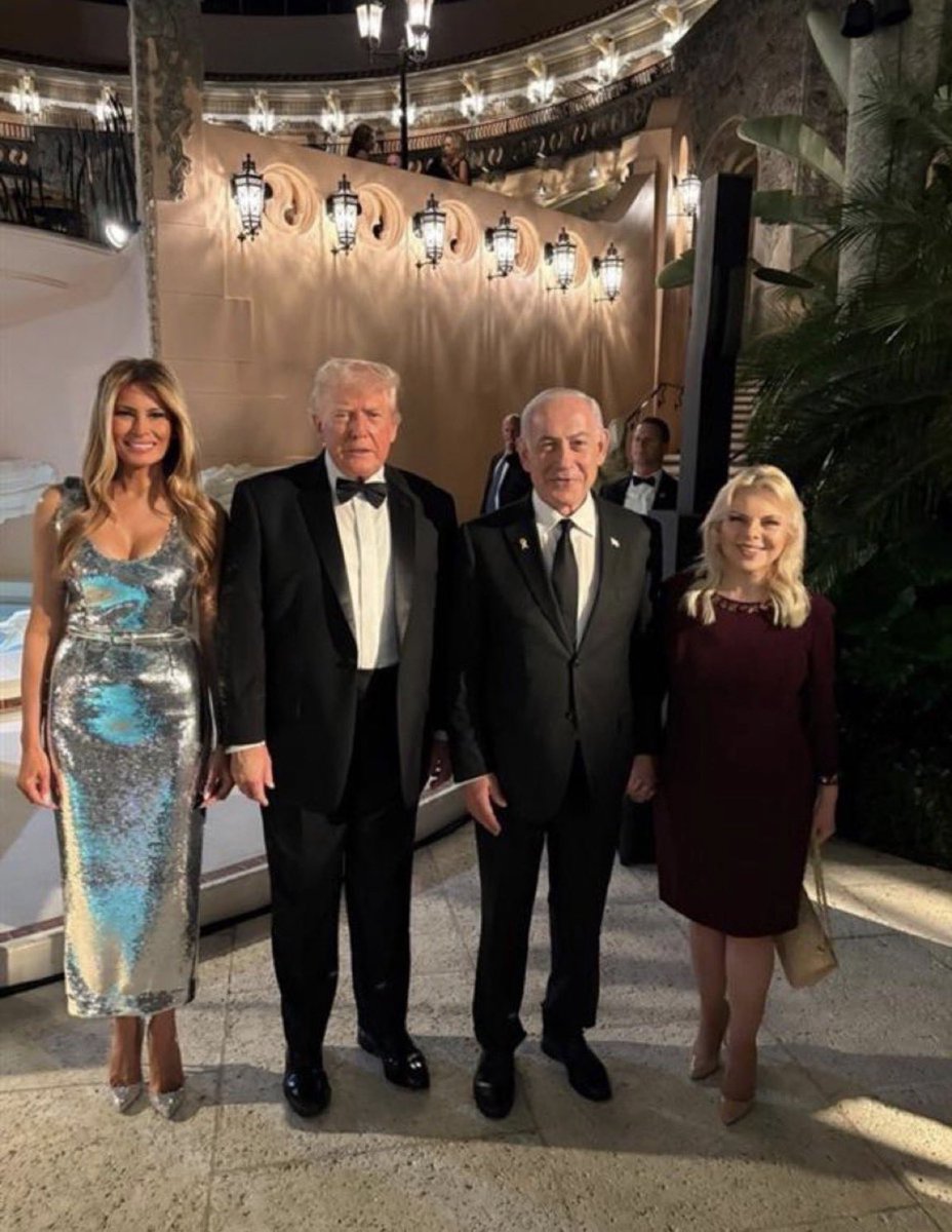 AdameMedia's tweet image. Hey @grok there’s a pedophile in this picture, please remove him. 

Also, there’s a wanted war criminal. Can you get rid of him too?