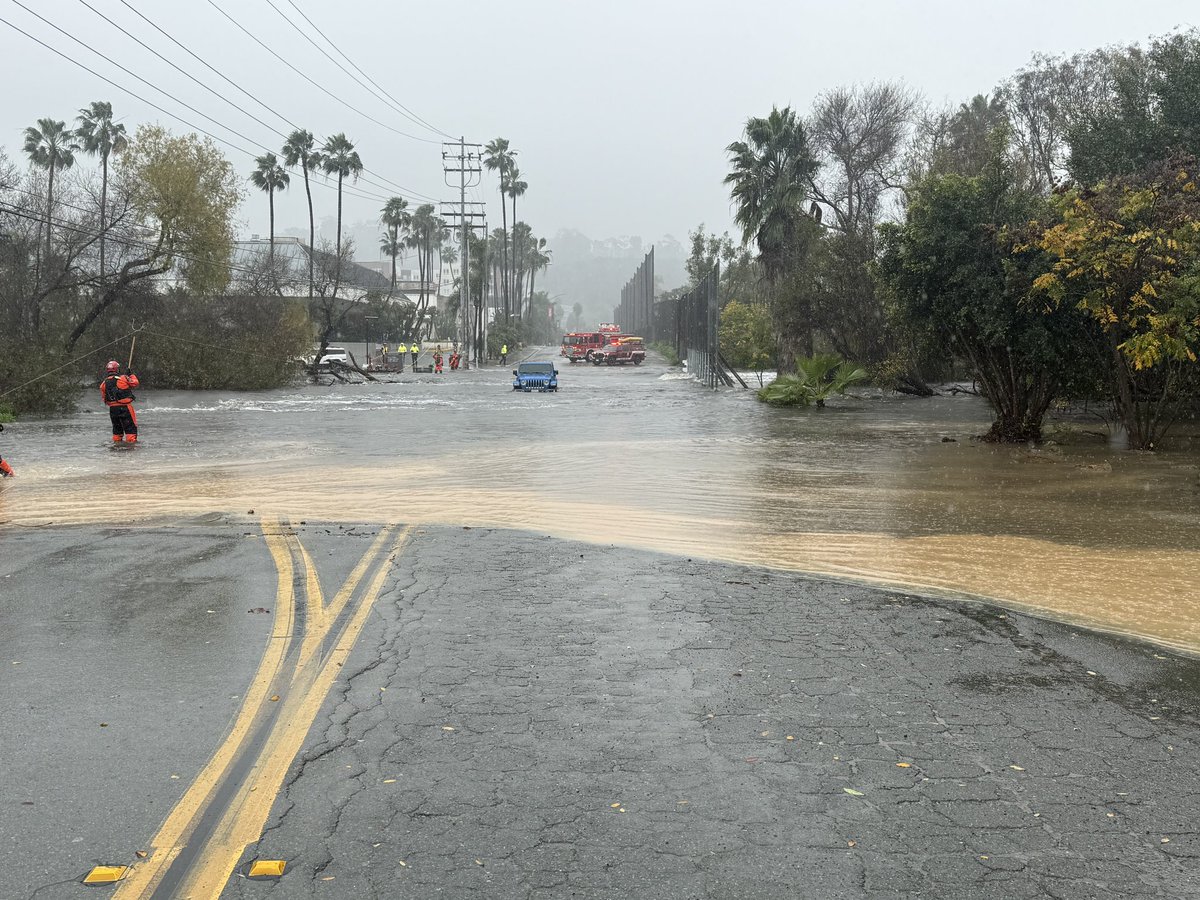 SDFD's tweet image. Our swiftwater rescue teams are actively working to rescue individuals stuck in their cars along Fashion Valley Rd &amp;amp; Riverwalk Dr.

⚠️Stay safe, SD. Please avoid the area &amp;amp; never walk or drive through floodwaters. Just 12" of fast moving water can carry away a vehicle.