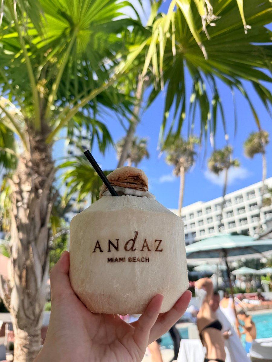 he afternoon in Miami is bright and sunny, with the beach filled with laughter and joy. 
#SunshineBeach #HappyTimes