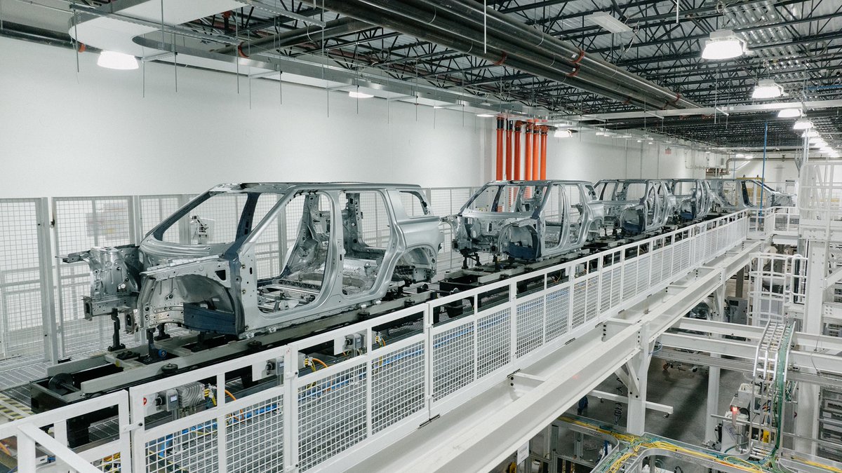 Rivian's tweet photo. Happy New Year! We’re so thankful for everyone at Rivian for an incredible 2025 and we can’t wait to bring R2 to you this year! https://t.co/ixHKVOPJk7