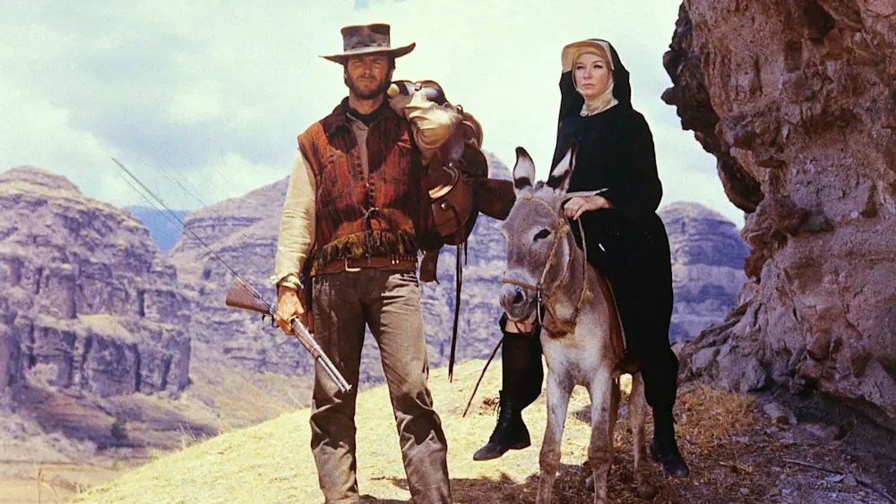 RanesHook's tweet photo. Happy New Year, action fans! We're blasting off 2026 with the #321Bang #NewYears Action Extravaganza with TWO MULES FOR SISTER SARA! Cowboy merc #ClintEastwood and feisty nun #ShirleyMacLaine light up a revolution ain't nobody'll ever forget! https://t.co/E8id8r3bCU https://t.co/hwE43luKnB