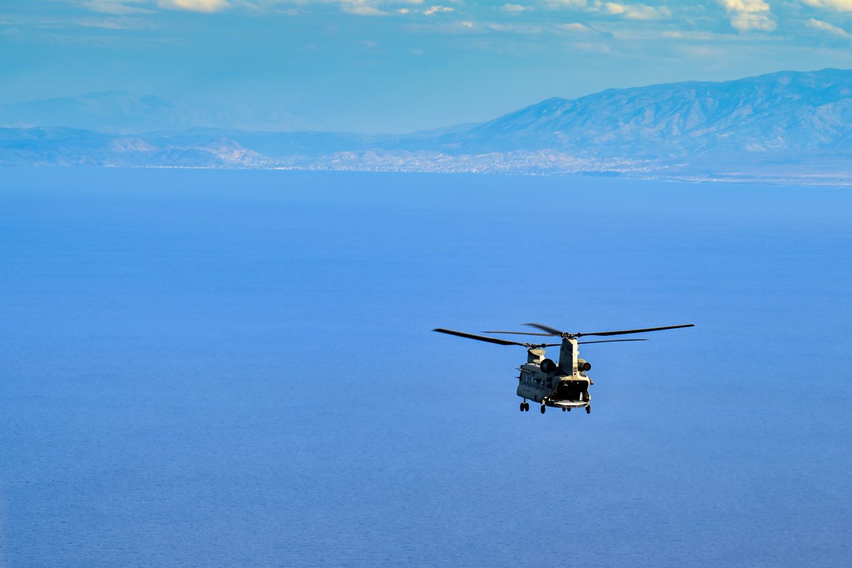 Southcom's tweet image. Aircrews assigned to @JTF_Bravo operate a pair of @USArmy CH-47 Chinooks while conducting a routine mission in the vicinity of Haiti Dec. 31, 2025, as part of #SOUTHCOM's support to the U.S. diplomatic mission in Port au Prince. 

As the command’s go-to expeditionary force, the…