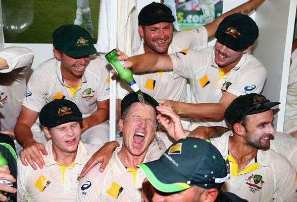 Australian cricket team celebrate as they can now enjoy a celebratory beer after a match without offending Usman Khawaja.