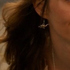 buckleysthinker's tweet image. robin earrings being a little dinosaur and a sword :')