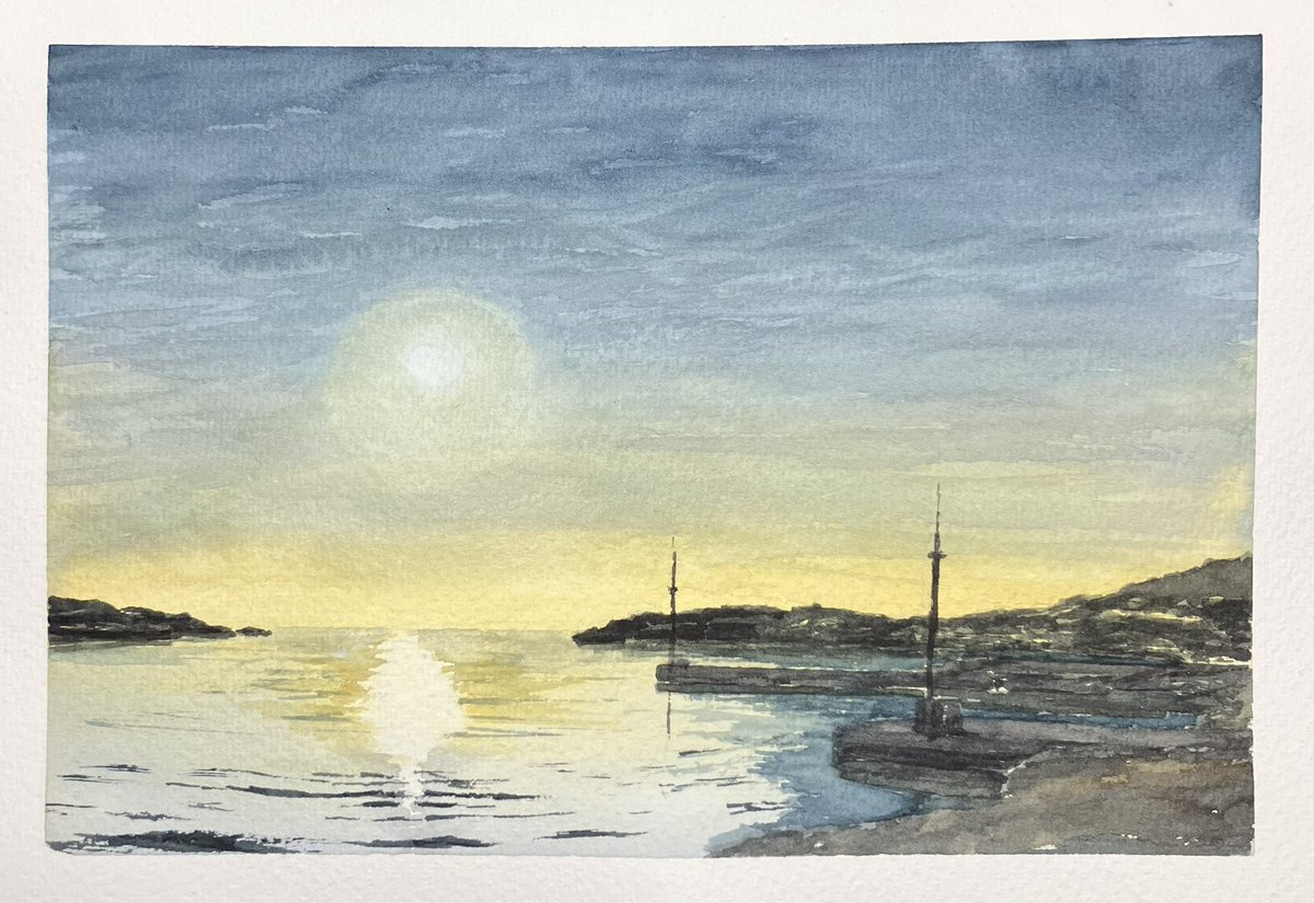 元旦の日没を見物に来た人で賑わう あお電、西浦駅下りホームの端から