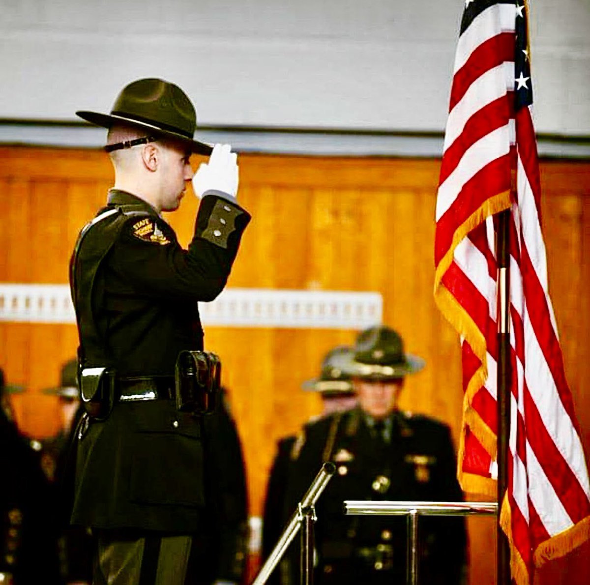 Signal99Cinci's tweet photo. This OSP Trooper took his life…and that sentence should stop every single one of us cold.

Sergeant Matthew Cook was not a headline. He was a son, a husband, a Trooper, a Daddy.

Matt wore the badge long enough to understand its weight—the visible weight, the symbolic weight, the kind the public romanticizes. But there is another weight the public rarely sees. The kind that settles in your chest. The kind that doesn’t come off at end of your shift.

The badge is heavy on a good day.
It carries responsibility. Authority. Expectations. It carries every call you ran, where you arrived too late.
Every child you couldn’t save. Every death notification you delivered with a steady voice while something inside you cracked.

Then…there is the mourning band—a different kind of weight. 

A thin strip of black fabric. Simple. Silent…yet when it’s affixed, the badge becomes heavier in a way words struggle to capture—and those that know, know. That band is not symbolic…it is personal.

It means another name etched into memory. Another empty chair at roll call. Another family shattered—Blood and Blue family alike.

It means the reminder never leaves your chest. It presses into it…yet still—we expect cops to carry on, without missing a beat. 

We train them to run towards the chaos. We teach them to compartmentalize grief. We reward stoicism—and we mock vulnerability.

We still whisper about “mental toughness” while quietly punishing those who admit they’re drowning.

Let’s be honest about the stigma—because it is still very real. Too many cops believe asking for help will end their career. Too many fear being benched, labeled, or quietly sidelined. Too many have been conditioned to believe that strength means silence…and tears are for the weak. So they carry it. And they carry it. Until sometimes they can’t…and 6-8 of us carry them. 

This is not weakness…this is accumulated weight—and it is killing our cops.

If you are reading this and you wear a badge—hear this clearly: you are allowed to hurt. You are allowed to ask for help. You are allowed to say, “I’m not okay.”

If you are a Leader—this is on you. Culture is not built by posters or slogans. It’s built by what happens when someone raises their hand and says they’re struggling. Do you protect them—or do you bury them?

And if you are the public—this is your moment to stop talking at cops and start praying for them.

Tonight, we ask you to hit your knees. We ask you to pray for Sergeant Matthew Cook.
Pray for his wife. Pray for his children. Pray for his parents.
Pray for his Brothers and Sisters in uniform who are quietly replaying their own breaking points right now…
because this should never have happened…and because the weight of the badge—especially when wrapped in black, was never meant to be carried alone.

Lord, we pray for the loss of this man…we pray for his salvation in you Lord—and we pray that you surround Matt’s family with comfort and peace. We pray for the Ohio State Highway Patrol. Comfort them Lord and keep them safe. 

If you are struggling…please reach out. You matter more than the silence. If you need to talk to someone anonymously, or would like details for resources, our DMs and emails are always open. 

Rest in heavenly peace Troop. 💔💙