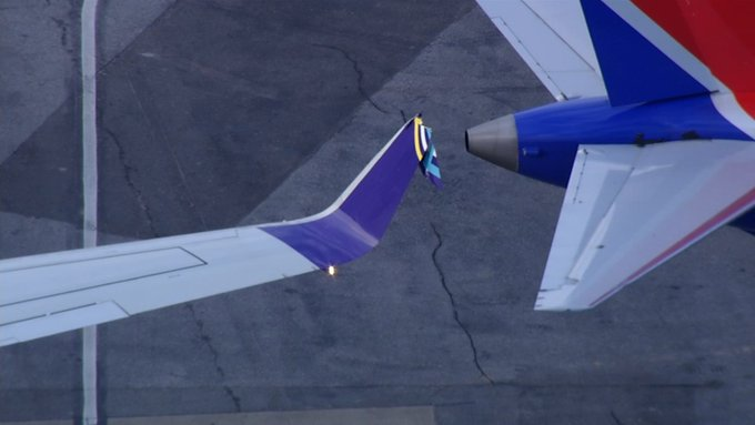 aviationbrk's tweet photo. Two 737s sustained damage after one clipped the other at Raleigh-Durham International Airport on New Year’s Day.

The incident occurred when an Avelo 737-700 that was being towed clipped into a parked Southwest 737 MAX on Thursday morning, according to RDU officials.

Nobody was on board either of the planes, and no injuries were reported.

RDU officials said that airport operations were not affected.

In a statement Avelo said its plane is being inspected by maintenance, and any customers who are all affected will be communicated with regarding their flight.
